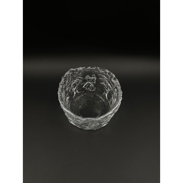 Kosta Boda's artistic bowl from the Rhapsody series, designed by Kjell Engman in Sweden in the 1970s, is crafted from...