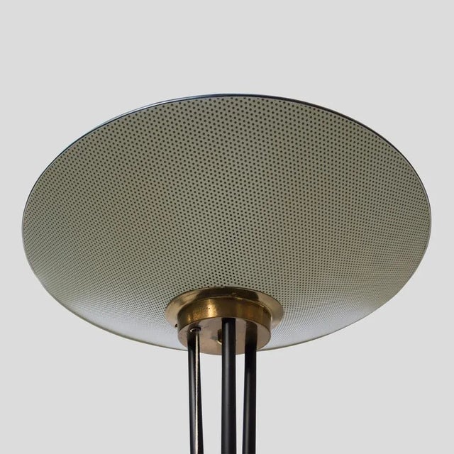 Floor lamp, Black enamel on metal frame Black and cream colour metal shade in disk shaped with brass details. Made by...