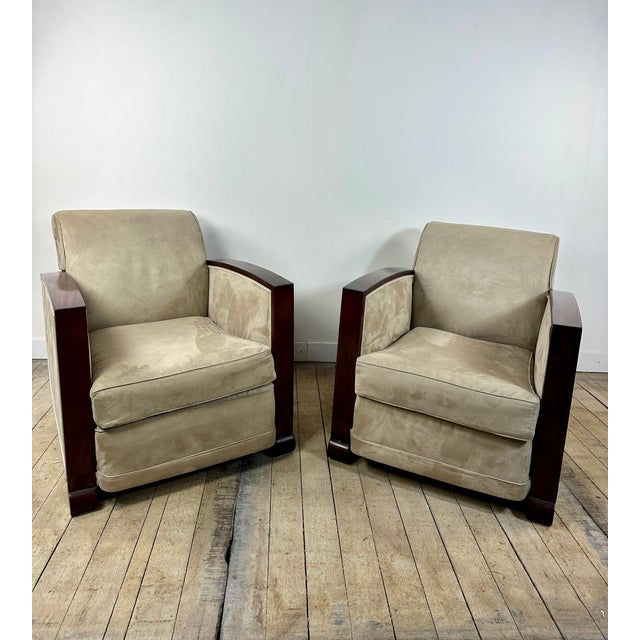 Elegant pair of Art Deco armchairs, combining clean lines with generous proportions. Beautifully structured profile. Solid...