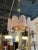 Exquisite Italian pink Murano glass and brass disc chandelier. The textured glass on the discs is a gorgeous pale pink....