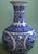 A striking and monumental vintage Chinese blue and white porcelain "Tianqiuping" (Celestial Sphere) globe vase. Standing...