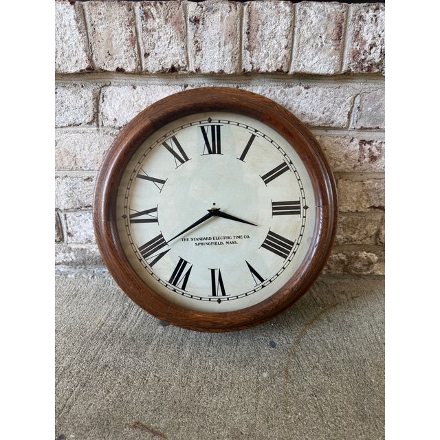 Vintage wooden wall hung clock from Springfield Massachusetts. This classic vintage clock will add character and charm to...