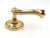 Modern brass braided door lever paired with a round rosette. The original rosette mounting screws are not available. Good...