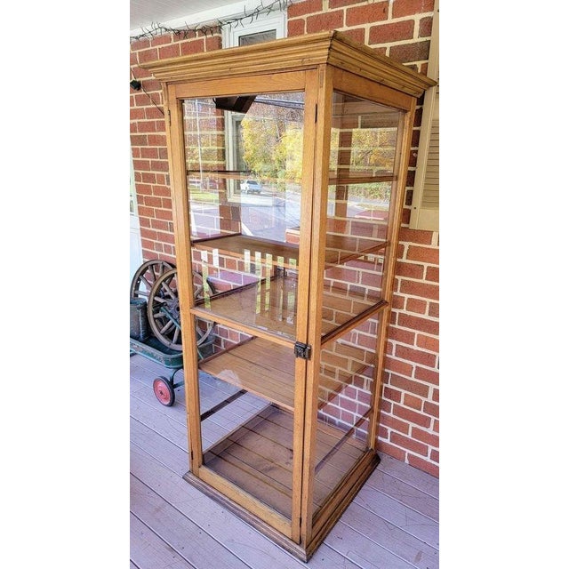 Tall antique bakery case, wood & glass, original patina and hardware. Glass has been replaced and is newer. Wood is...