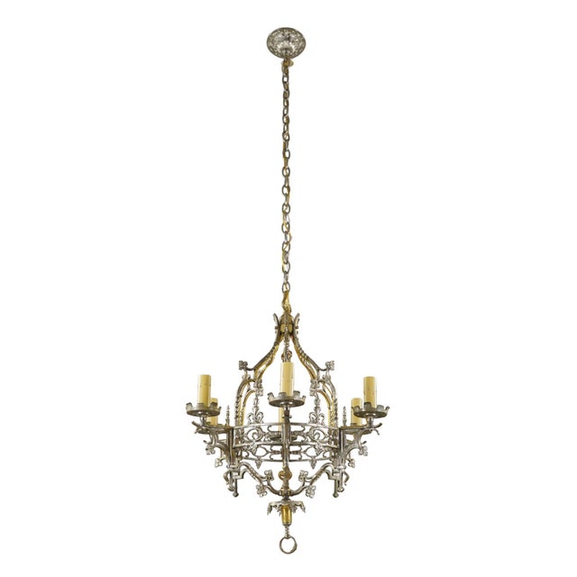 A great example of Gothic Revival craftsmanship, this six-light chandelier is cast in bronze with a two-tone nickel and...