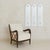 An Italian wall mirror from the 1960s, edged in a beveled border that catches light with subtle dimension. Its elongated...