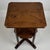A refined early 20th-century English side table, finely crafted from oak and displaying the restrained proportions and...