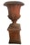 A striking vintage terracotta urn on pedestal, handcrafted in Italy and inspired by classical Neoclassical design. This...