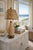 Offering a restored seagrass wicker table lamp & shade, circa 1960s. This gorgeous coastal seagrass lamp is authentic to...