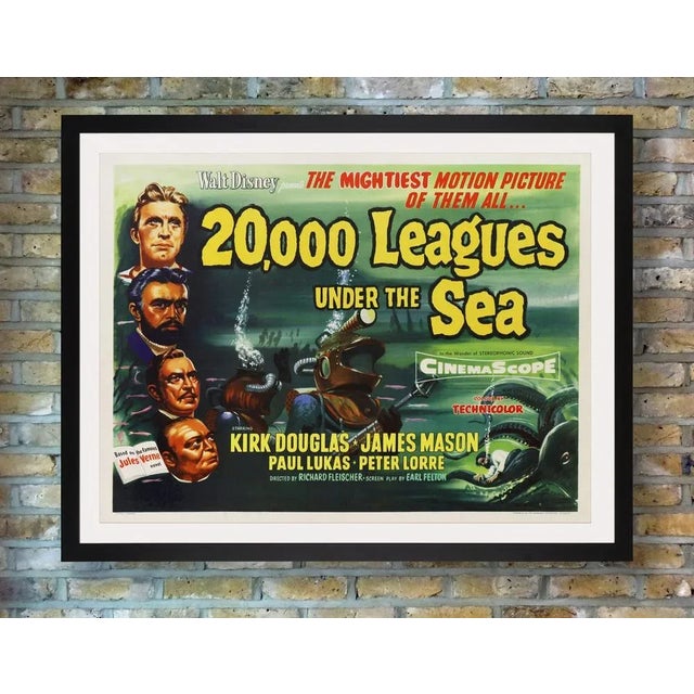 A rare british quad poster for the first uk release of walt disney's 1954 live-action sci-fi adventure '20,000 leagues...