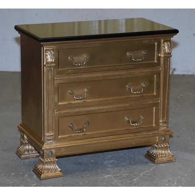 We are delighted to offer this lovely pair of gold over silver leaf paint bedside table sized chests of drawers A good...