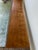 Mid-Century Modern long walnut coffee table or bench designed by Kipp Stewart for Drexel Declaration. Makers mark on...