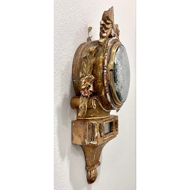 Unique wall decor. Antique French gilt wood clock housing with convex glass front refinished with a mercury glass mirrored...