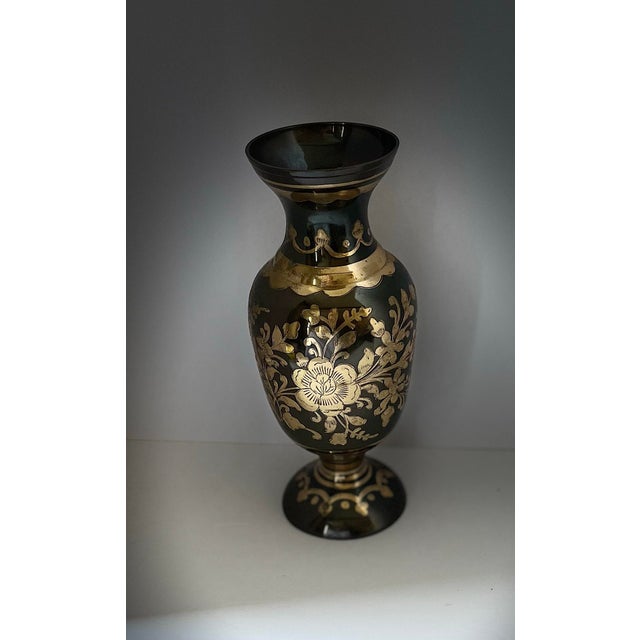 Beautiful vintage vase with ornate brass etching. Made in India. In excellent vintage condition, but please see photos as...