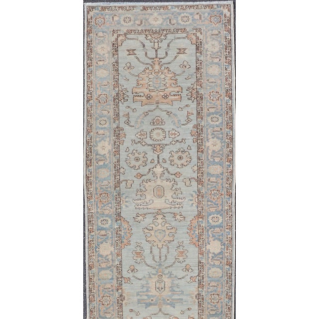 Measures: 3'0 x 17'8 Hand-Knotted Tabriz Style in Light Blue Runner by Keivan Woven Arts, 3' x 17'8". Keivan Woven Arts /...