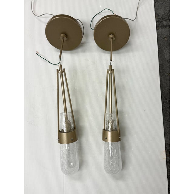 Design Plus Gallery presents a Pair of the Link Blown Glass Low Voltage Sconces from Hubbardton Forge. This pair showcases...