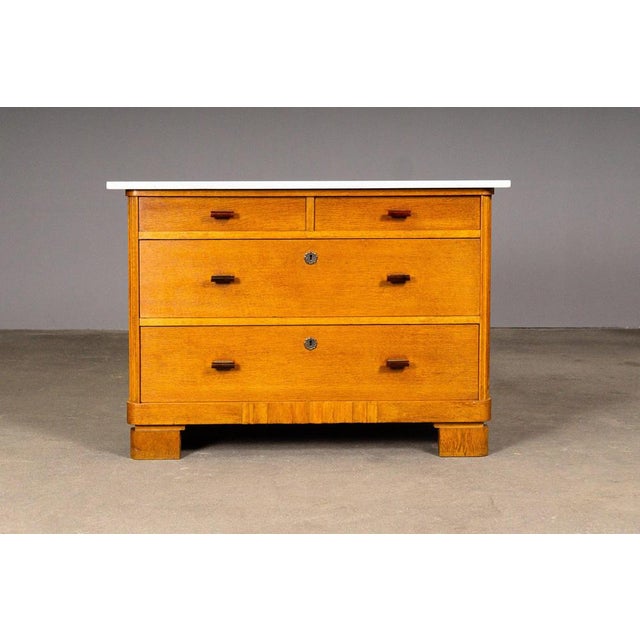 Item: Chest of drawers Period & Style: Art Deco - 1920s/30s Features: - Elegant and practical piece of furniture with...