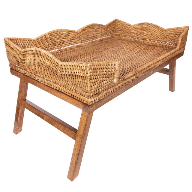 Crafted from sustainable Burmese rattan, the Scallop Design Breakfast Tray with Wooden Legs blends practical functionality...