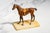 This charming antique cold-painted miniature horse sculpture, dating to circa 1915, captures the character and elegance of...