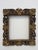 Gilded and bronzed wooden frame from the 17th century, central Italy. This Louis XIV frame features fine carvings with...