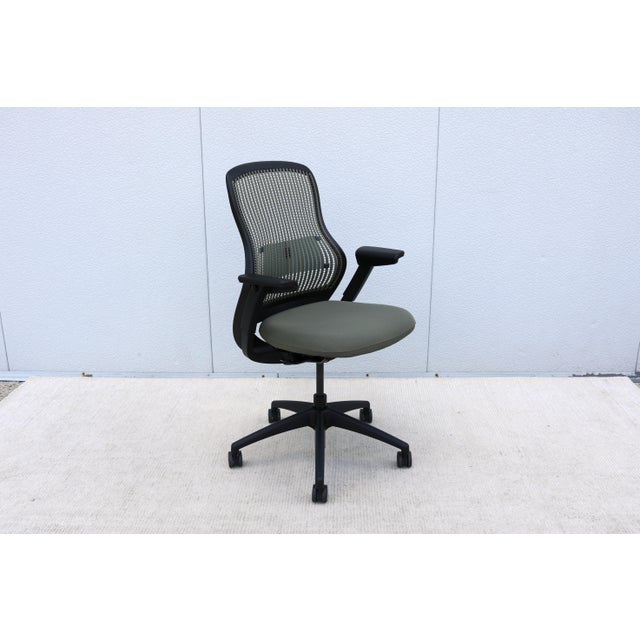 Knoll ReGeneration ergonomic office desk chair, fully adjustable in green fabric. ReGeneration by Knoll is designed for...