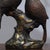 This exquisite piece depicts a pair of songbirds perched on a gnarled branch, their heads tilted toward each other as if...