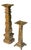 A striking pair of vintage sculptural candleholders featuring graduated architectural forms with a richly textured faux...