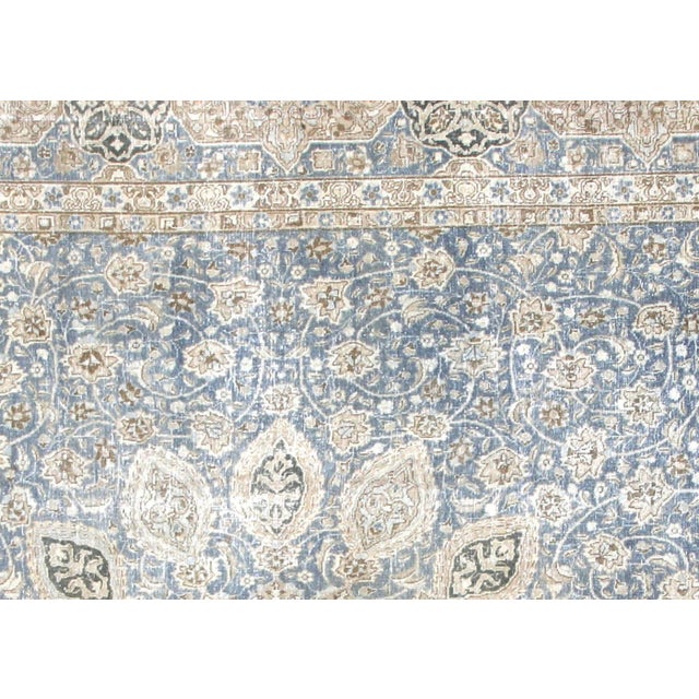 The Semi Antique Persian Tabriz Rug, woven by hand in the renowned Tabriz region of Northern Iran, has been carefully...