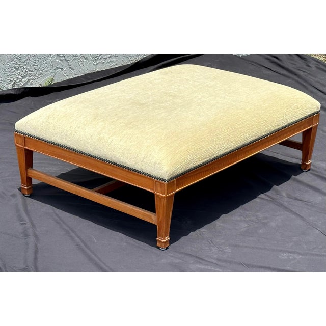 A refined teak “Hameau” bench designed by John Hutton for David Sutherland, a brand synonymous with luxury indoor/outdoor...