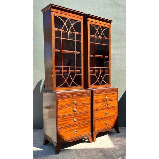 This exceptional pair of 19th-century George III style diminutive cabinets represents the pinnacle of English-influenced...