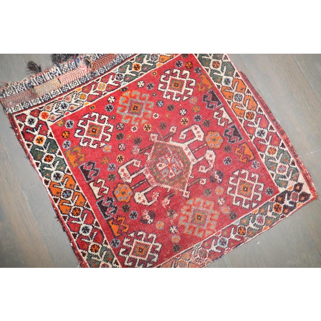 a mid 20th century persian bagface rug