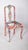 Painted dining chair. with decorative carvings on the upper edge, it has been decorated with contemporary multicolored...