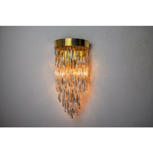 Superb and rare venini waterfall wall lamp designated and produced in italy in the 70s. Wall lamp composed of murano glass...