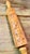 It is an embossing or molding rolling pin used to stamp intricate folk-art pictures—such as owls, birds, and floral...