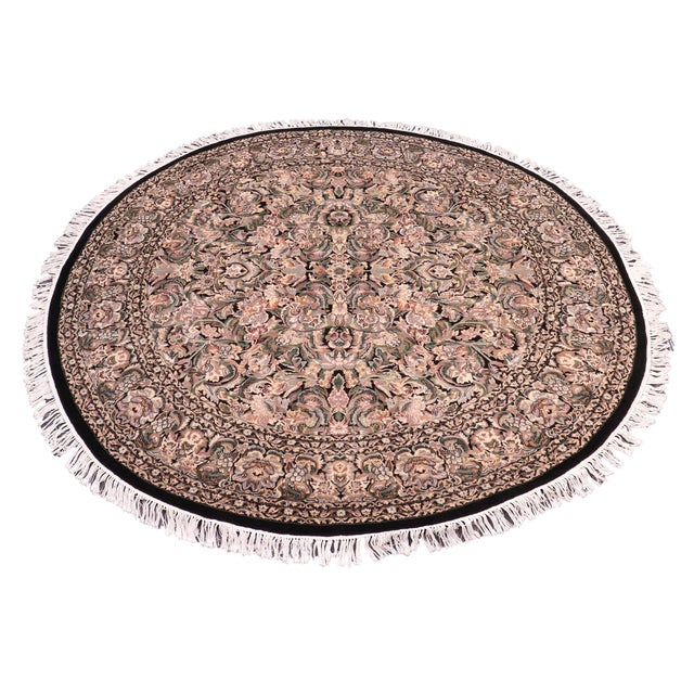 This hand‑knotted Pak Persian round rug showcases the finest expression of traditional Persian artistry. Each piece is...