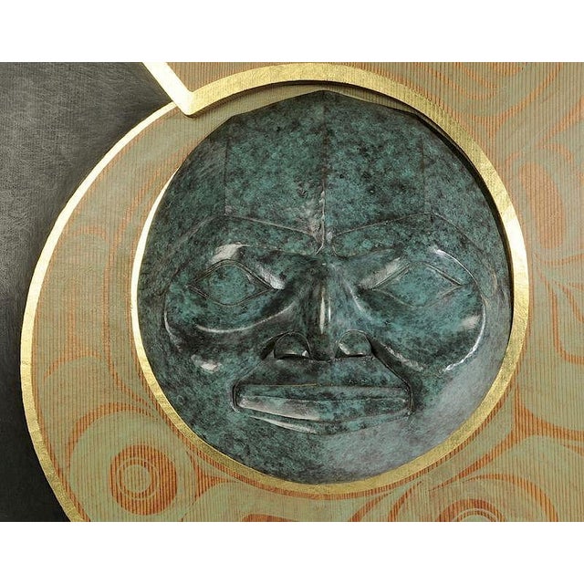 Loren White (Seattle, Washington, 20th/21st century) Moon Mask, bronze, red cedar, acrylic and gold leaf, signed on...