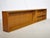 Minimalist mid-century wall shelf made of teak, 1960s. Long, low-profile design with a large open compartment on the left...