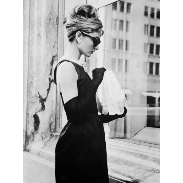 Lunch on Fifth Avenue June 1961: Audrey Hepburn (1929 - 1993) stops for lunch on Fifth Avenue in New York during location...