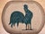 This vintage American hand-hooked rug features a striking pictorial depiction of a proud rooster standing tall and...
