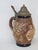 This wonderful vintage beer stein is made of ceramic with a metal lid. It features a marvelous relief depicting a sweet...