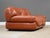 A post modern brown leather Sapporo loveseat sofa designed by Mario Marenco for Mobilgirgi. Attempt to restore color to...