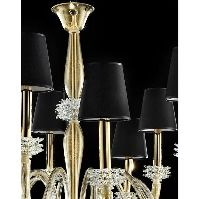 Contemporary transparent chandelier in murano glass with “rostrato” cup full of gold leaf inside. very luxury chandelier...