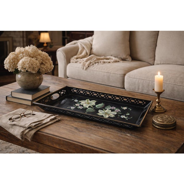 "Black metal floral tray," "Hand painted flower platter,"serving tray with a deep pierced gallery and hand-painted lilies...
