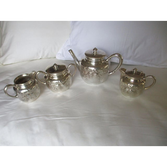 This is a Fabulously Beautiful Antique Homan Silverplate Company Silverplate Tea Service with a Large Tea Pot and Large...