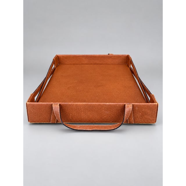 A beautiful example of Gucci's understated Italian craftsmanship, this vintage serving tray is crafted from rich cognac-...