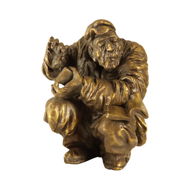 Atlie Bronze Figure of an Older Man Crouching, Reading, Striking Match For Sale