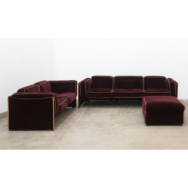 Cassina duc complete living room set in original burgundy velvet, designed in the 1970s by mario bellini it consists of...