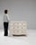 This piece presents as a chest of drawers, distinguished by white painted finish, 3 drawers, brass pulls. It was made in...