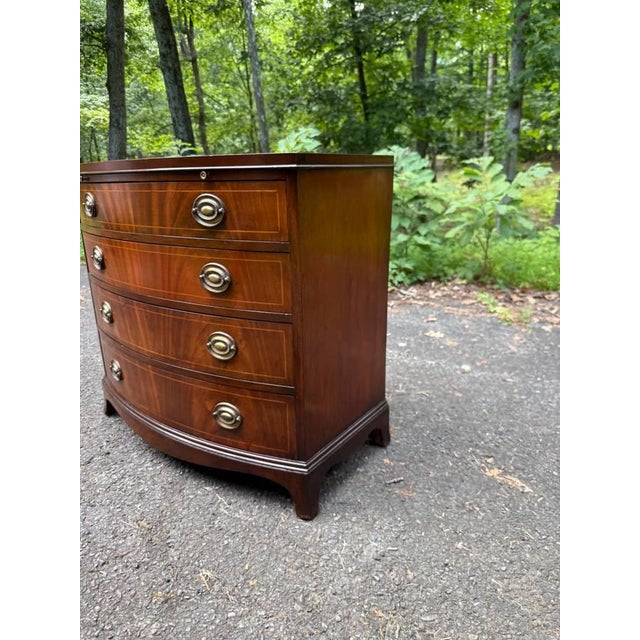 Late 20th Century Late 20th Century Georgian-Style Bowfront Flame Mahogany Chest of Drawers by Baker Furniture. For Sale - Image 5 of 17