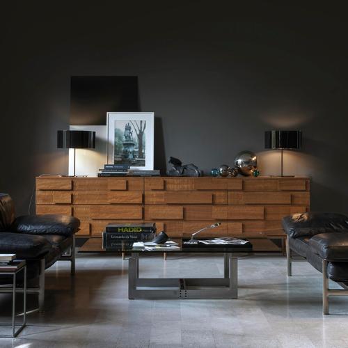 Table lamp 'switch' designed by nendo in 2007. Table lamp giving direct and indirect light. Metal structure and reflector....